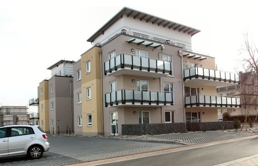 Neubau Mehrfamilienhaus und Reihenhaushälfte1